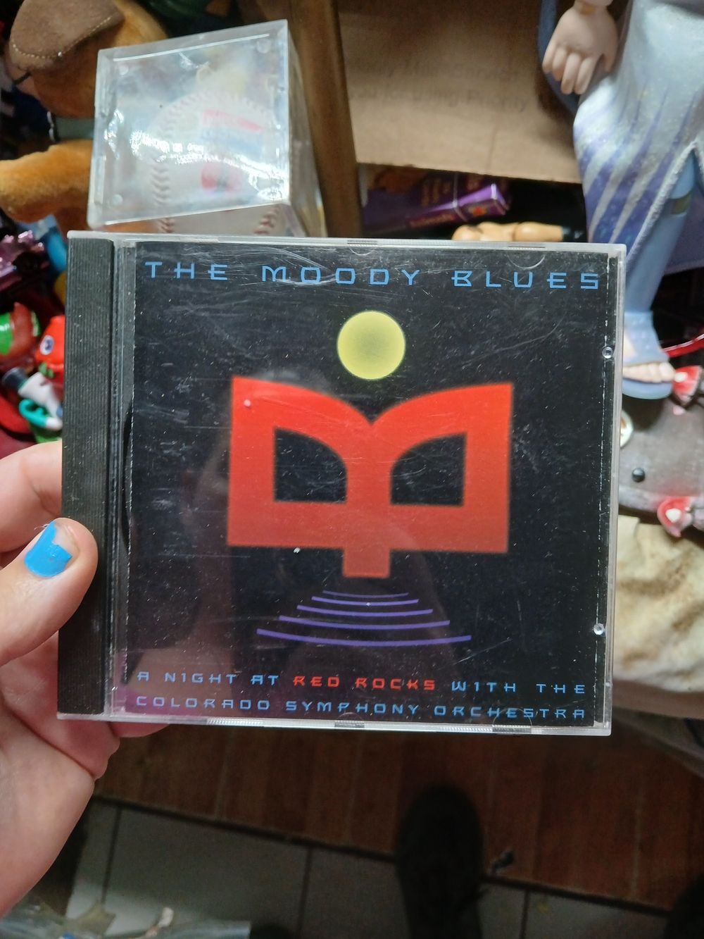 live performance album CD by The Moody Blues titled A Night at Red Rocks with th